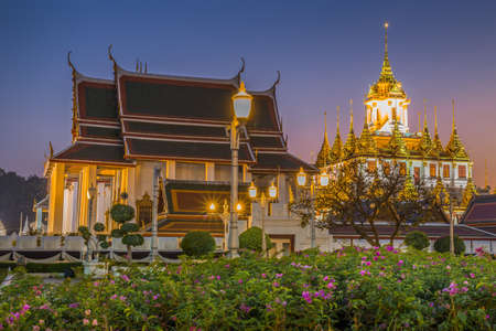Wat Ratchanatdaram a Beautiful temple at twilight time, the temple is best known for the Loha Prasat famous landmark for tourist in Bangkok,Thailandの写真素材