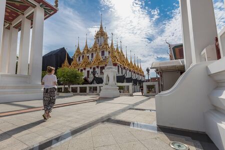 Wat Ratchanatdaram a Beautiful temple at daytime, the temple is best known for the Loha Prasat famous landmark for tourist in Bangkok,Thailandの写真素材