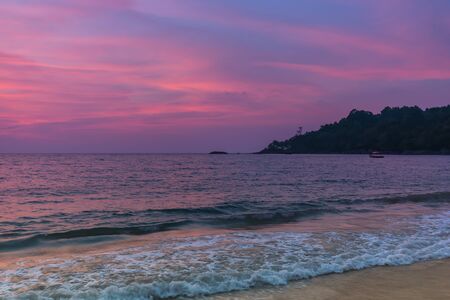 beautiful landscape with tropical sea sunset on the beachの写真素材