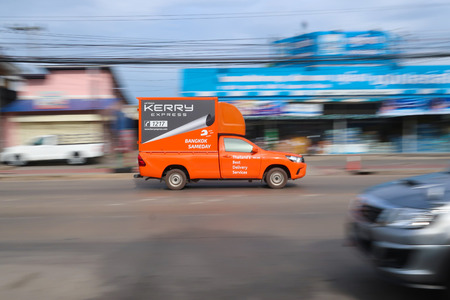 The Kerry express logistic truck running on street for send box to customer on June,08,2018 at...