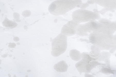 Used white  paper  with oil stain