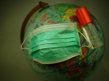 Mask and hand sanitizer for the prevention of Covid19 disease from the coronary virus that is spread around the world.の写真素材