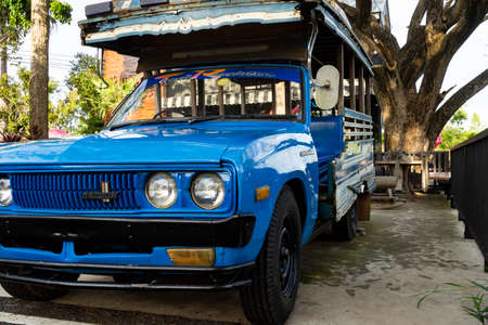 Buriram, Thailand - 21 September 2020: Songthaew Passenger - Old pickup truck, used as a taxi or bus. Parked in the food garden for tourists to viewのeditorial素材