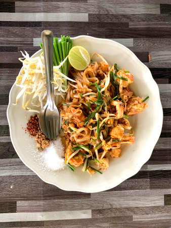Pad Thai is a Thai dish made from stir-fried noodles with meat and vegetables. Season to taste as we want.の写真素材