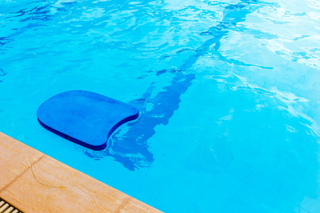 pool kick board in swimming poolの写真素材