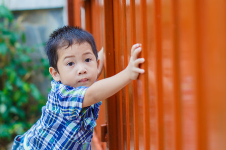 Boy sliding doorの写真素材