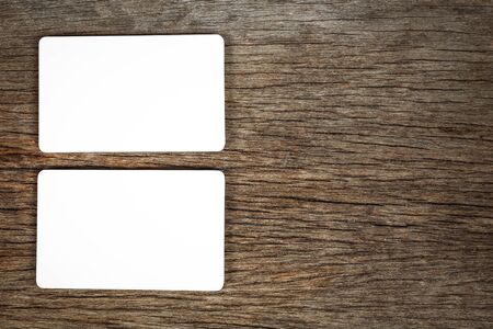 Blank business card on wood grain background detail object artの写真素材
