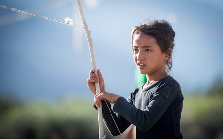 Leh Ladakh , India - August 9 : young Tibetan girl posing at the camera 9, 2015のeditorial素材