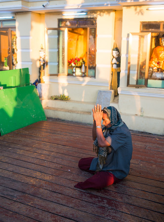 Kyaikhtiyo, Myanmar -  February 22: Unidentified People Praying in Kyaikhtiyo, Myanmar 22, 2017のeditorial素材