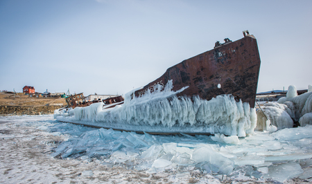 Old rusty ship on lake Baikal, Russiaの写真素材