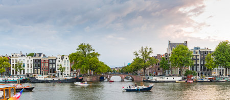 Panorama amsterdam Canals with bridge and dutch houses, Netherlandsの写真素材