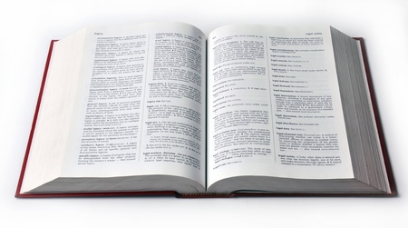 Open dictionary book isolated on white background.の写真素材