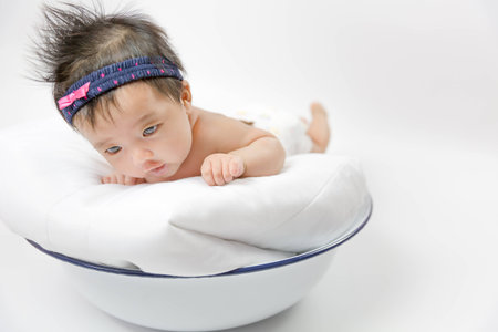asian baby in the basketの写真素材
