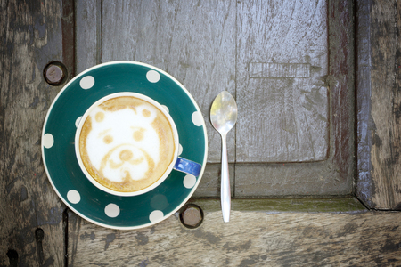 Coffee cup on wooden tables - vintage effect style picturesの写真素材
