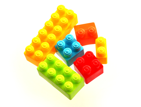 Plastic toy blocks on white background