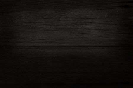 Black wooden wall background, texture of dark bark wood with old natural pattern for design art...