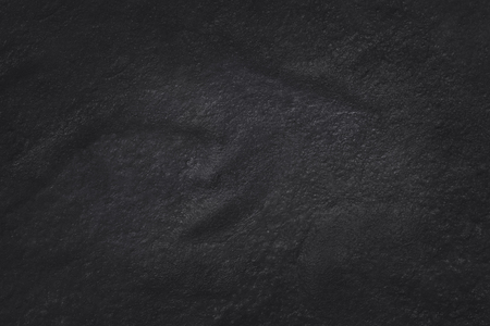 Dark grey black slate texture in natural pattern with high resolution for background and design art work. Black stone wall.の写真素材