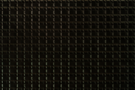 Black rubber texture background with seamless pattern.