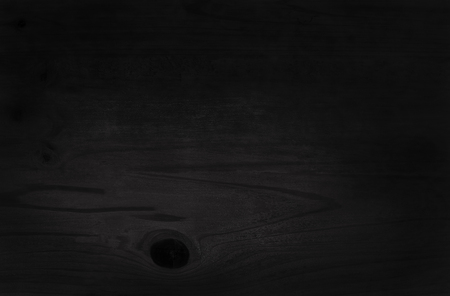 Black wooden wall background, texture of dark bark wood with old natural pattern for design art work, top view of grain timber.の写真素材