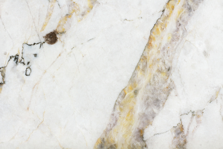 Natural marble with golden texture for background and design ceramic counter luxurious, top view of tiles stone in seamless pattern.の写真素材