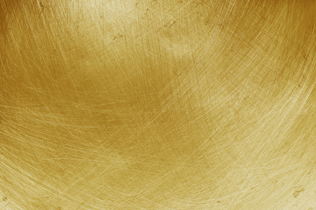 aluminium texture background with gold gradient, pattern of scratches on stainless steel.の写真素材