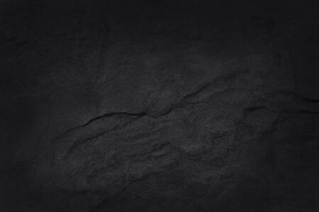 Dark grey black slate texture with high resolution, background of natural black stone wall.の写真素材