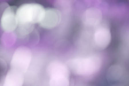Purple bokeh blurred background, abstract leaf light and sunlight with out of focus.の写真素材