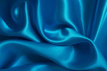 Blue fabric cloth texture for background and design art work, beautiful crumpled pattern of silk or linen.の写真素材
