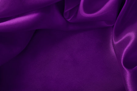 Purple fabric cloth texture for background and design art work, beautiful crumpled pattern of silk or linen.の写真素材