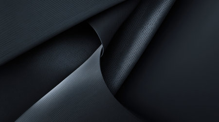 This image showcases a sophisticated layered black texture, perfect for backgrounds in various design projects, conveying elegance and depth in modern aesthetics.の素材