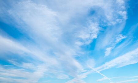 Blue sky with cloudsの写真素材