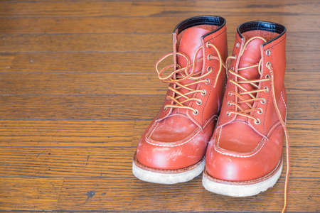 Boot fashion on wooden background