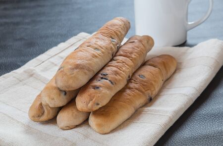 Raisin bread  on fabric,selective focus