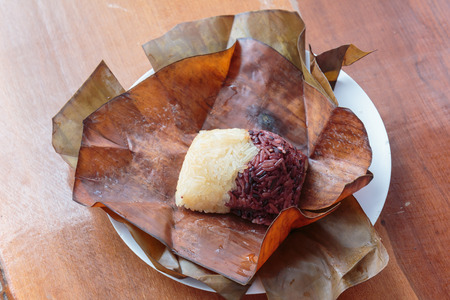 Sticky rice wrapped in banana leaves