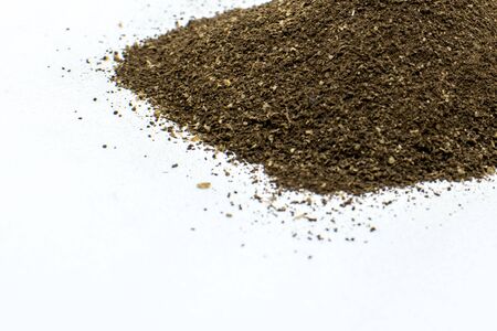 Black pepper on white background