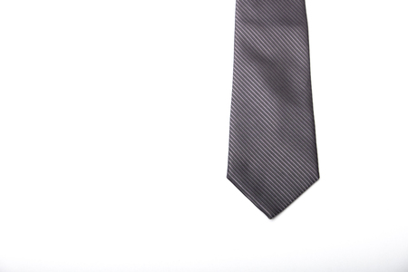 black striped necktie on a white backgroundの写真素材
