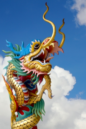 Chinese dragon statue on the skyの写真素材