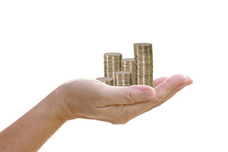Stack coin in hand.