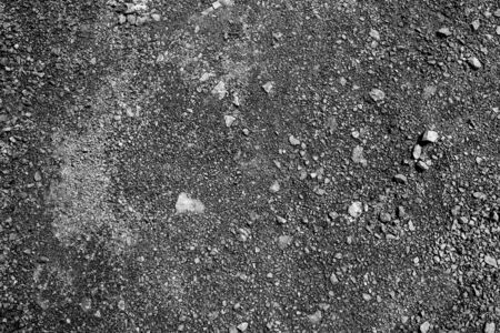 Monochrome Pebble surface, stone texture or rock backdrop, ground background.の写真素材