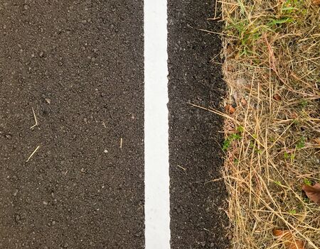 Close-Up of Road markings on asphalt. Road line.