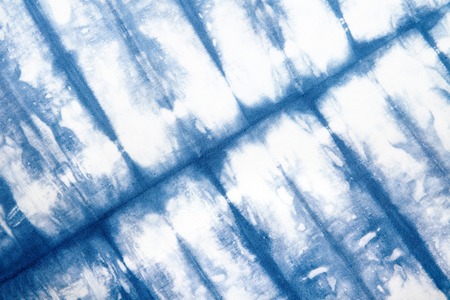 Abstract tie dyed fabric backgroundの写真素材