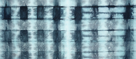Abstract tie dyed fabric backgroundの写真素材