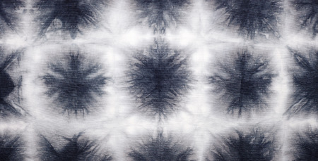 Abstract tie dyed fabric backgroundの写真素材