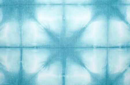 Abstract tie dyed fabric backgroundの写真素材