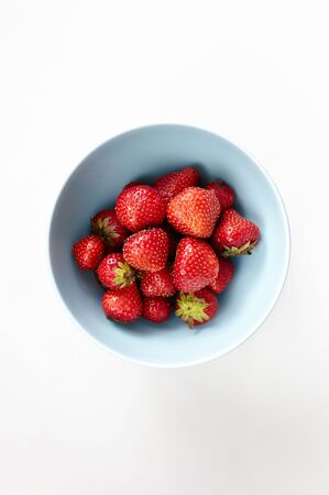Fresh and juicy strawberries on a white backgroundの写真素材