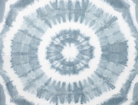 Abstract tie dyed fabric backgroundの写真素材