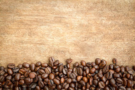 Roasted coffee beans on woodenの写真素材