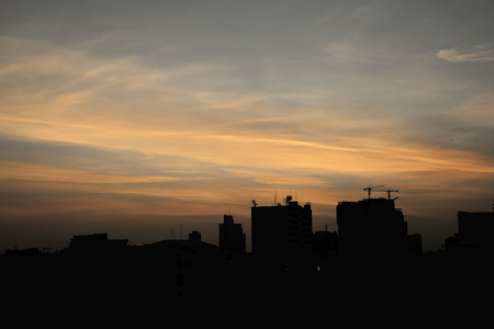 City silhouette with warm color skyの写真素材