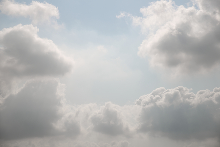Abstract white cloud over clear blue sky backgroundの写真素材