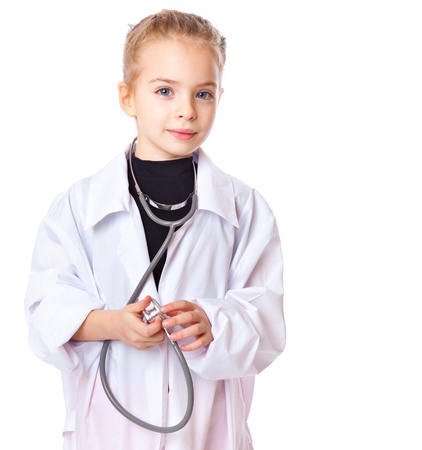 A girl is dressed as doctor. Isolated on a white backgroundの写真素材